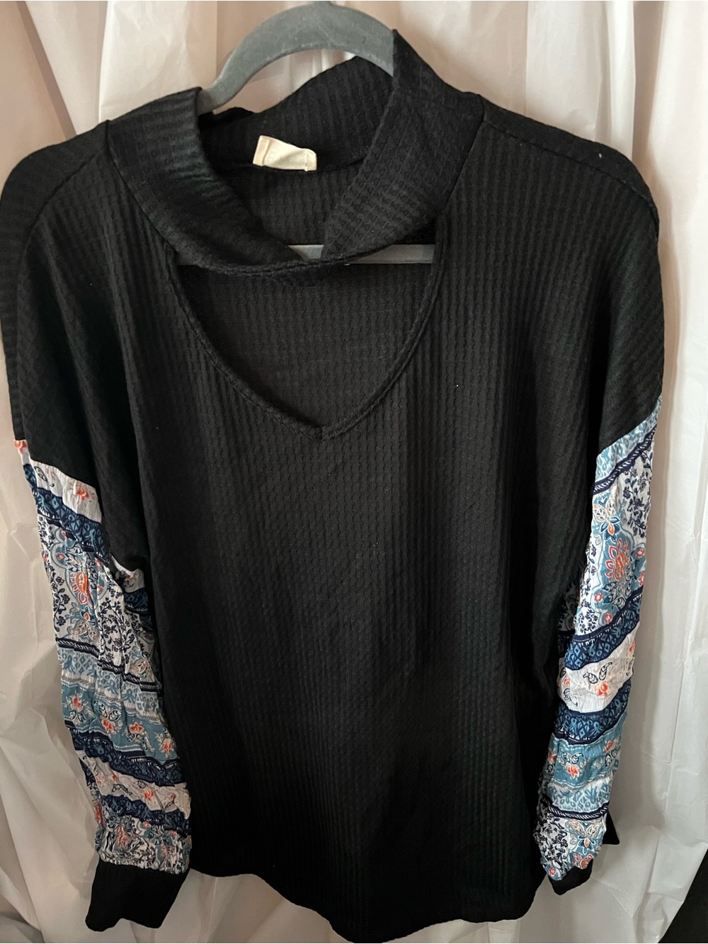 BiBi Black Top with Patterned Blue and White Sleeves